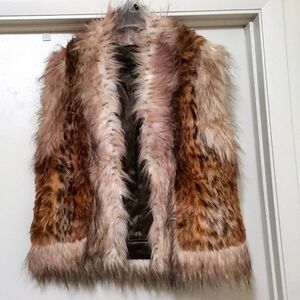 DAMSELLE NEW YORK FAUX FUR.